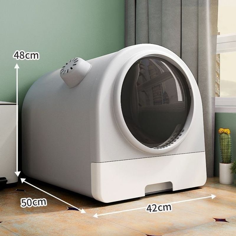 Smart cat litter box with automatic odor removal and enclosed drawer design